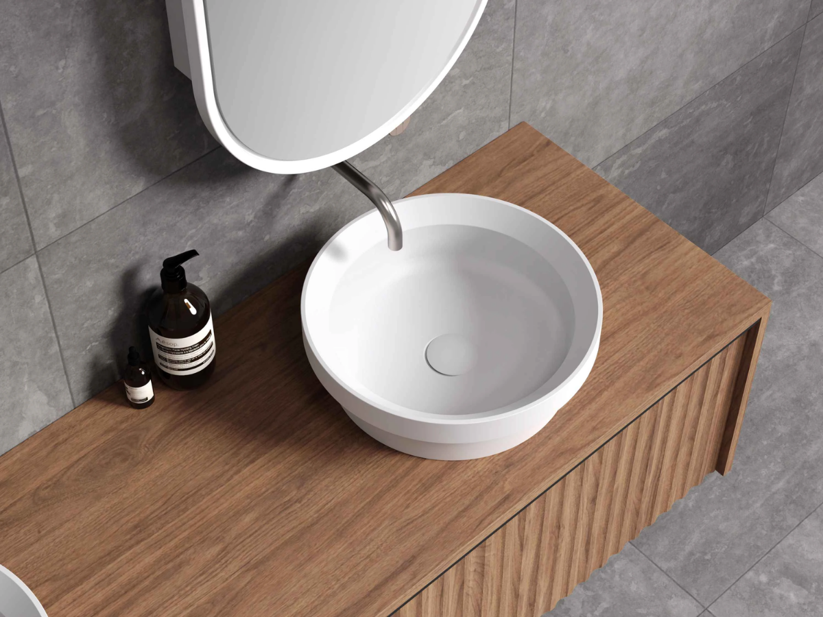 Which Bathroom Basin Is Right for You? Ceramic vs Solid Surface